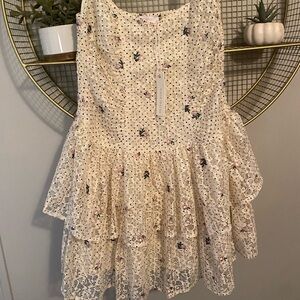 Super cute flattering ruffle lace dress! Size L NWT spaghetti strap